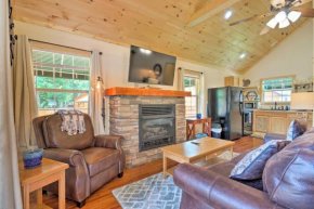 Cozy Riverfront Cabin with Private Deck and Hot Tub!